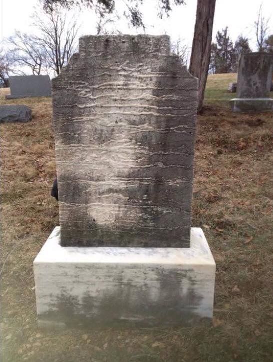 Face on a Tombstone